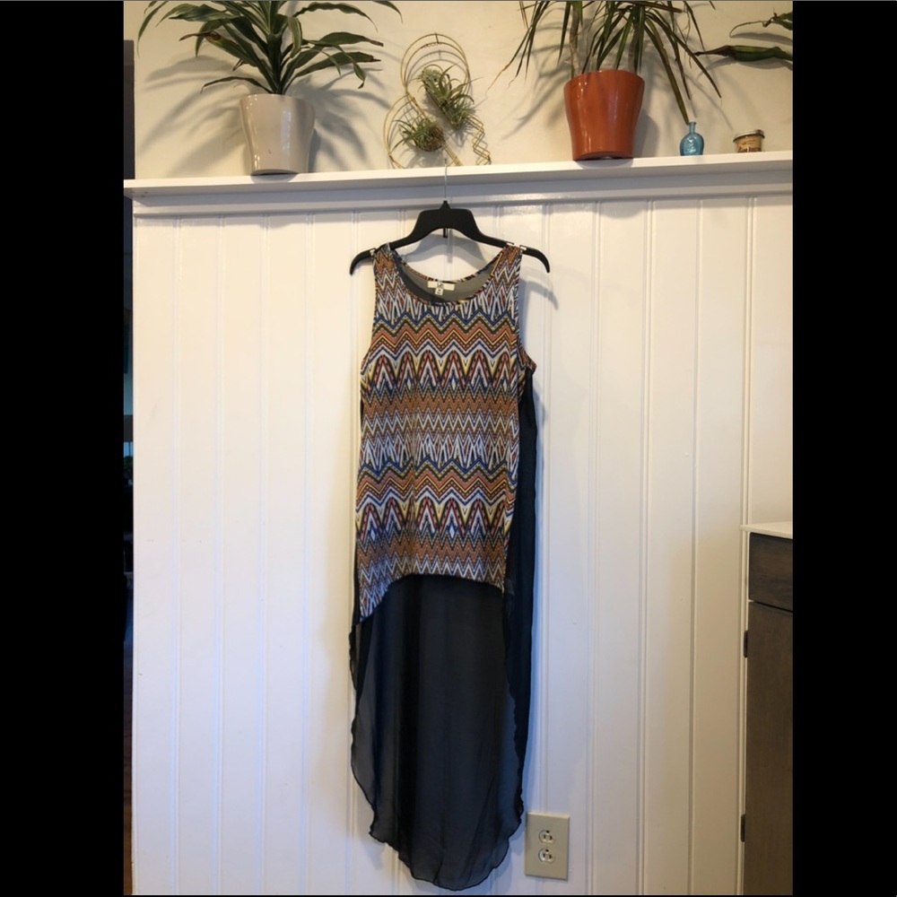 Sheer top with a long back